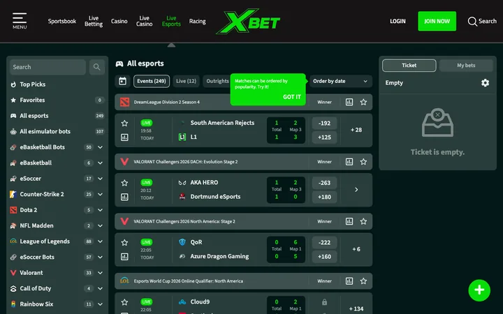 XBet sportsbook showing live esports markets and an open bet slip